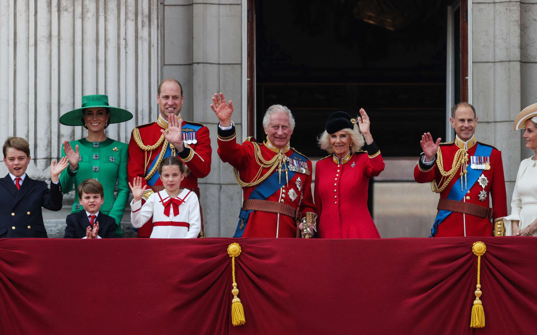 (L-R) Britain's Prince George of Wales, Britain's Catherine, Princess of Wales, Britain's Prince Louis of Wales, Britain's Prince William, Prince of Wales, Britain's Princess Charlotte of Wales, Britain's King Charles III, Britain's Queen Camilla, Britain's Prince Edward, Duke of Edinburgh and Britain's Sophie, Duchess of Edinburgh wave from the balcony of Buckingham Palace after attending the King's Birthday Parade, 'Trooping the Colour', in London on June 17, 2023. The ceremony of Trooping the Colour is believed to have first been performed during the reign of King Charles II. Since 1748, the Trooping of the Colour has marked the official birthday of the British Sovereign. Over 1500 parading soldiers and almost 300 horses take part in the event. (Photo by Adrian DENNIS / AFP)