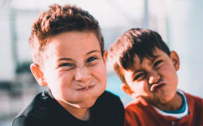 Boys making funny faces