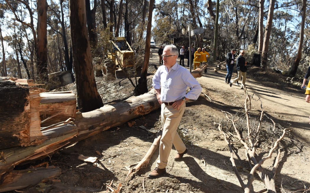 Australian Prime Minister Malcolm Turnbull visits the Wye River township and areas destroyed by the Christmas Day fires in Victoria.