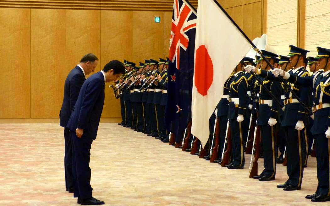 John Key and the Japanese PM Shinzo Abe arriving to the Guard of Honour.