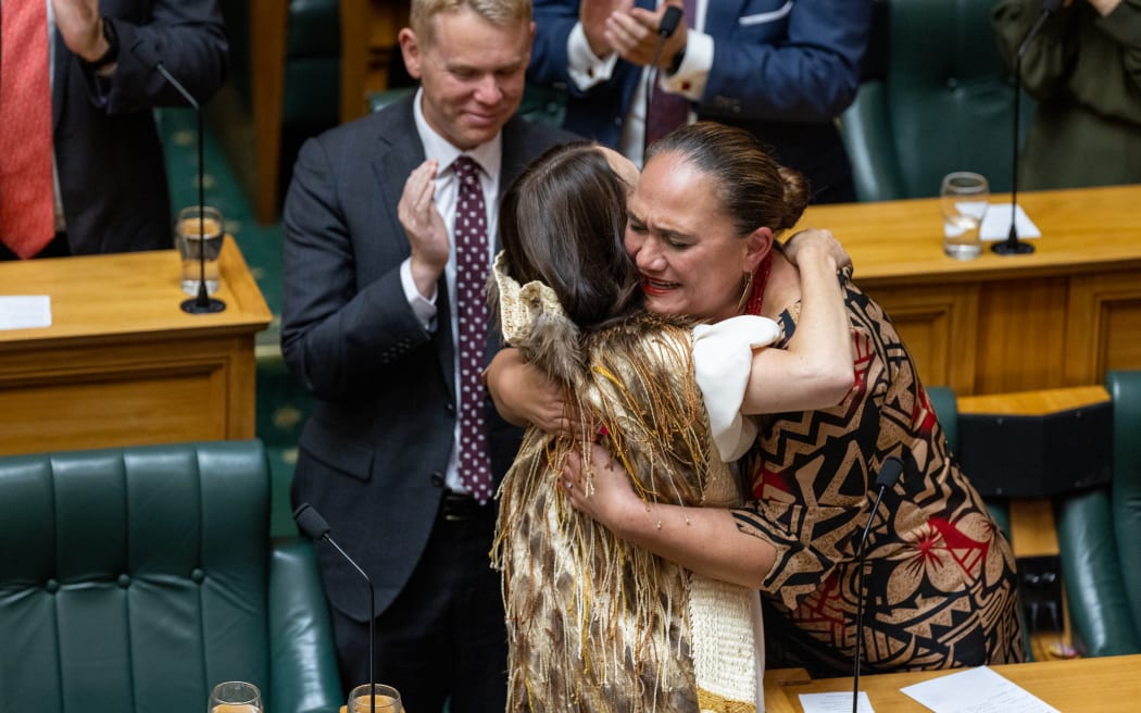 Deputy Prime Minister Carmel Sepuloni hugs Jacinda Ardern after her valedictory speech.