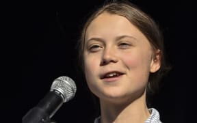 Swedish climate activist Greta Thunberg takes to the podium to address young activists and their supporters in Montreal.