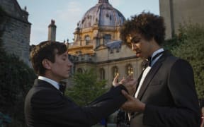 Barry Keoghan and Archie Madekwe in Saltburn.