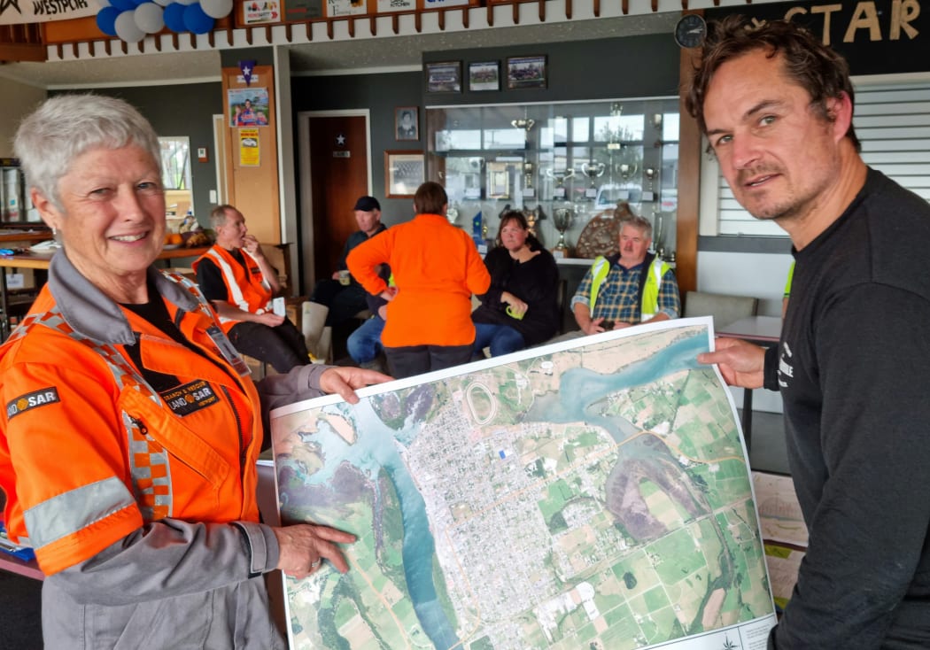 Westport LandSAR chair Sue Walsh, left, and volunteers at the temporary base set up to assist with the flood response.