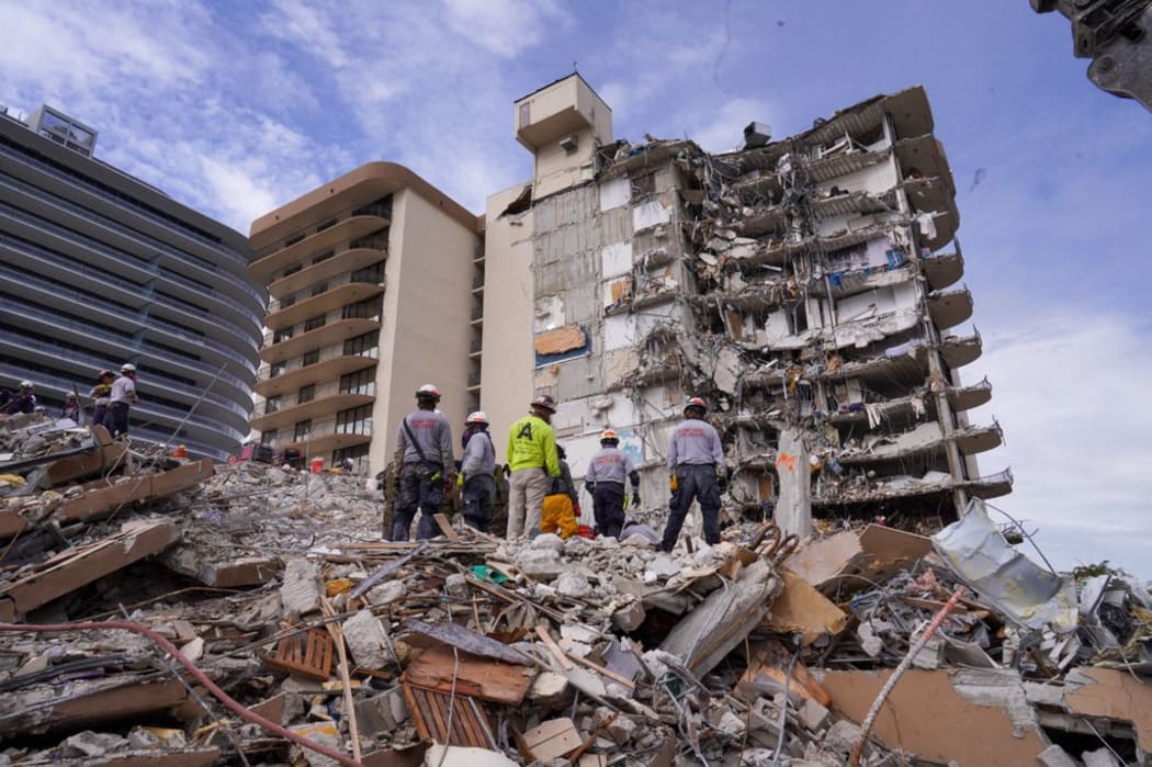 Search and rescue personnel work at the site of a collapsed Florida condominium complex in Surfside, Miami, US, on 3 July 2021.