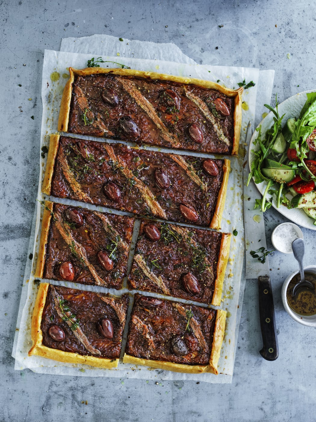 Classic pissaladiere with caramalised onions, anchovies and olives.