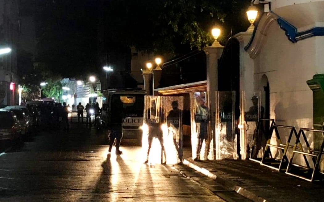 Security forces standing guard outside the Supreme Court in Male after Maldivian President Abdulla Yameen declared a state of emergency on February 5, 2018.