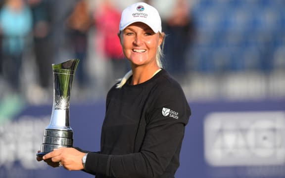 Sweden's Anna Nordqvist poses with the trophy after her victory in the Women's British Open, after a final round 69 at Carnoustie, Scotland on August 22, 2021.