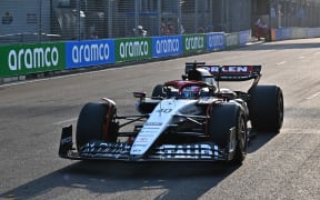 Alpha Tauri's New Zealand driver Liam Lawson drives during the third practice session ahead of the Singapore Formula One Grand Prix night race.