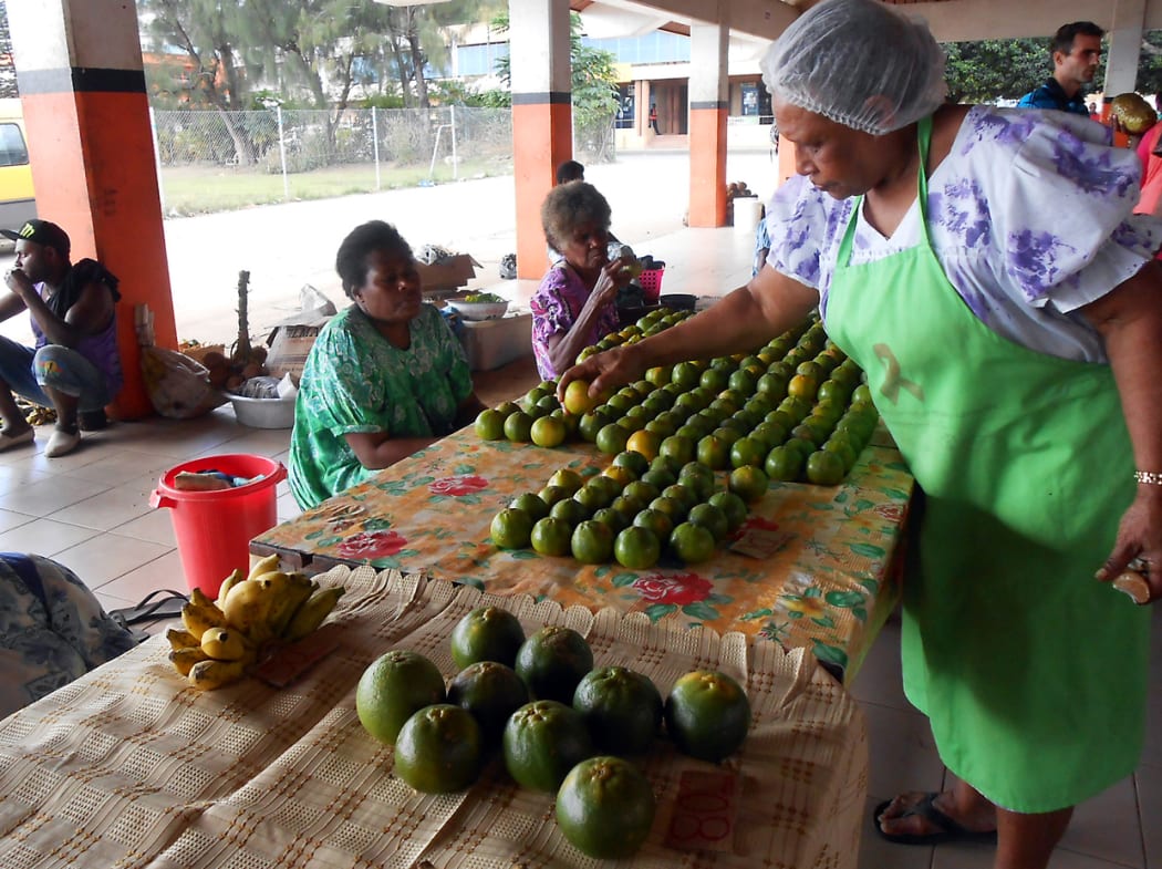 240414. Photo RNZ. Vanuatu. Port Vila, fruit, market, stall, ni-Vanuatu,
