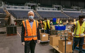 Mayor Phil Goff by the production line team at Spark Arena.