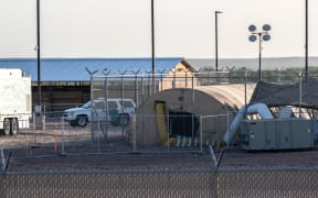 (FILES) In this file photo taken on June 21, 2019 a temporary facility set up to hold immigrants is pictured at a US Border Patrol Station in Clint, Texas. -