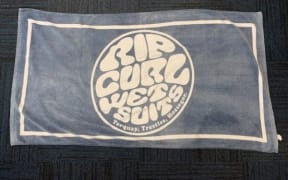 Police believe the towel pictured belongs to a young man who was found unresponsive in the water at Omanu Beach in Mount Maunganui on 8 Jaunary, 2022.