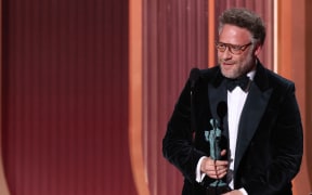 Canadian-US actor Seth Rogen accepts the award for Outstanding Performance by a Male Actor in a Comedy Series for "The Studio" during the 32nd Annual Actor Awards at the Shrine Auditorium in Los Angeles on March 1, 2026. (Photo by VALERIE MACON / AFP)