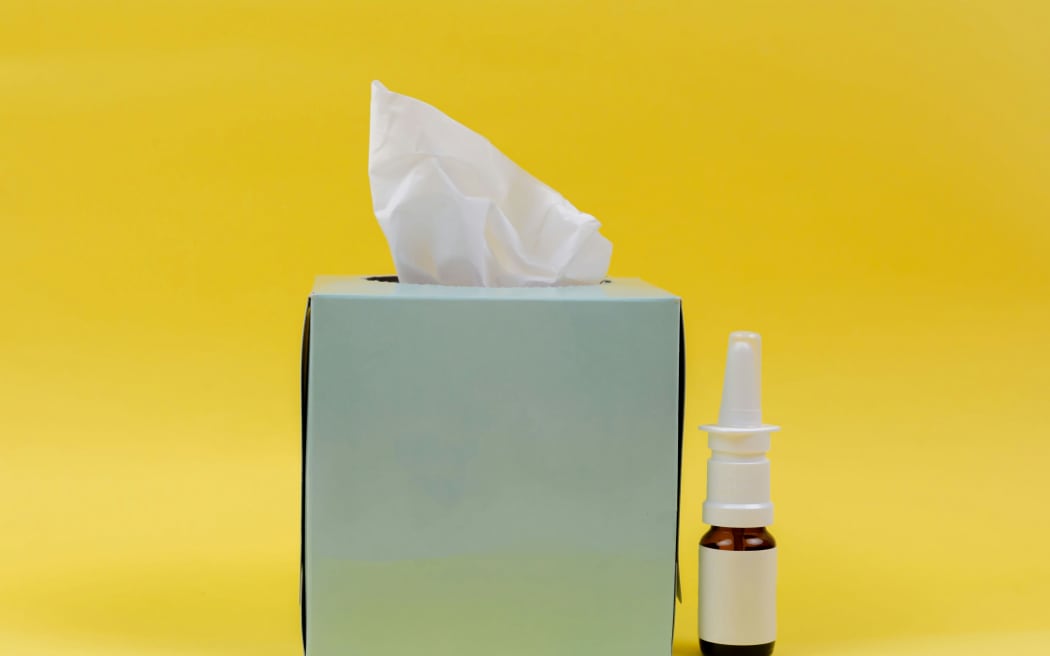 A box of tissues and some cold medicine