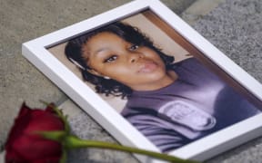 WASHINGTON, DC - JULY 30: A photo of Breonna Taylor is seen among other photos of women who have lost their lives as a result of violence during the 2nd Annual Defend Black Women March in Black Lives Matter Plaza on July 30, 2022 in Washington, DC.   Leigh Vogel/Getty Images for Frontline Action Hub/AFP (Photo by Leigh Vogel / GETTY IMAGES NORTH AMERICA / Getty Images via AFP)