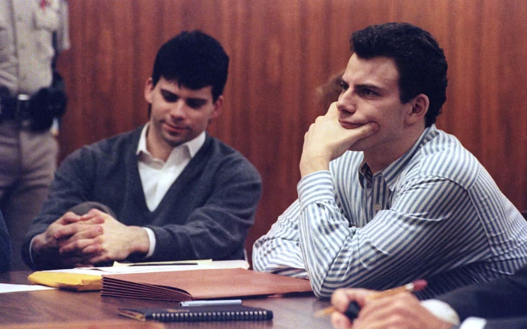 Erik Menendez (R) and brother Lyle listen to court proceedings during a May 17, 1991 appearance.