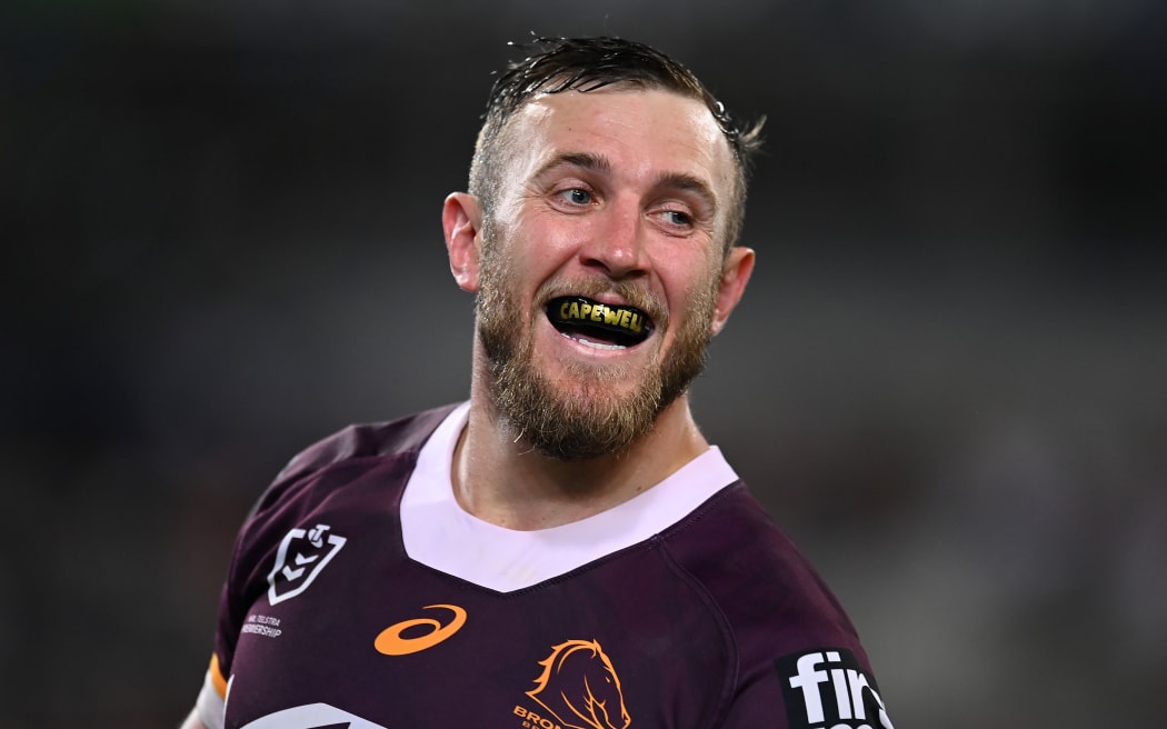 Kurt Capewell of the Broncos celebrates scoring a try.