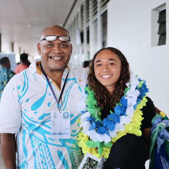 Wale Tobata standing proudly with his daughter Jordan Evans-Tobata