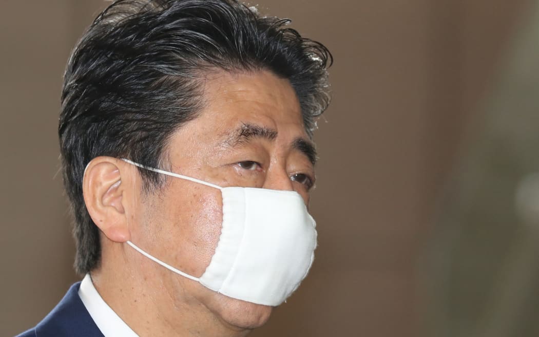 Japanese Prime Minister Shinzo Abe arrives at his office in Chiyoda Ward, Tokyo on 25 May 2020.
