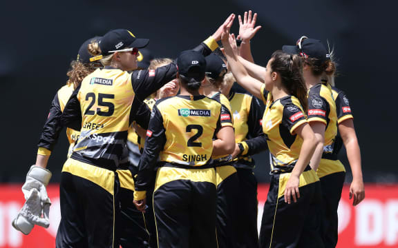 The Blaze celebrate Sparks' captain Katey Martin being caught during the Dream 11 Super Smash cricket match between the Wellington Blaze & Otago Sparks at the Basin Reserve in Wellington. 24 January 2021.