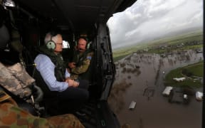 Australian Prime Minister Malcolm Turnbull surveys flooding in Queensland in the aftermath of Cyclone Debbie.