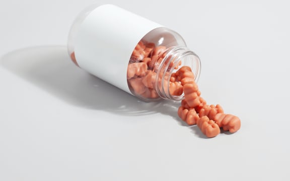 A generic image of supplements tumbling from a jar