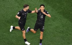 INGLEWOOD, CALIFORNIA - JUNE 15: Elijah Just #11 of New Zealand celebrates with teammate Tim Payne #2 after scoring his team’s second goal during the FIFA World Cup 2026 Group G match between IR Iran and New Zealand at Los Angeles Stadium on June 15, 2026 in Inglewood, California. (Photo by Stu Forster/Getty Images)