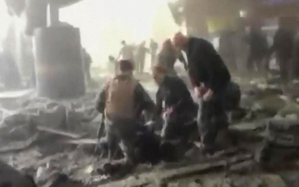 This image grab made on March 22, 2016 from a video by RTL TVI shows people inside Brussels airport in Zaventem after a blast.