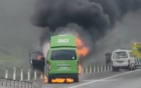 Jucy rental van on fire.