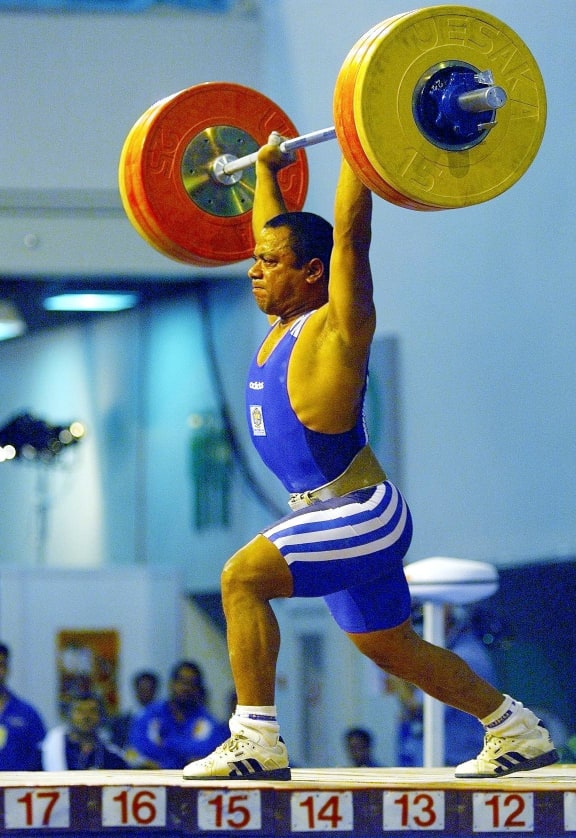 Marcus Stephen lifting 167.5 kg to break the Commonwealth record in clean and jerk 62-kg category at the Commonwealth Games, 1998.