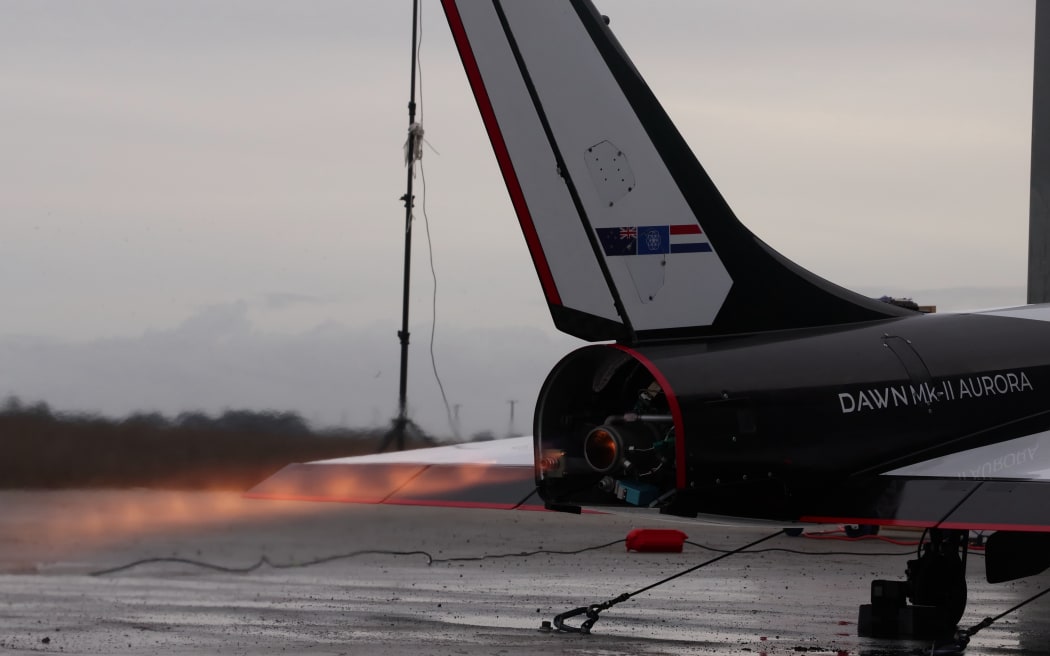 Mk-II Aurora, Dawn Aerospace's unmanned rocket-powered space plane, tests its jet while on a runway in June 2024.