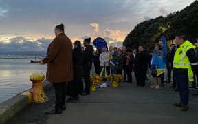 People at Ukraine war anniversary event in Wellington
