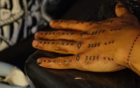 Finished hand tattoo, designed by Vaimaila Urale, tattooed by Chris Amosa.