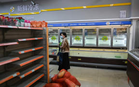 Woman shopping in Shanghai, China.