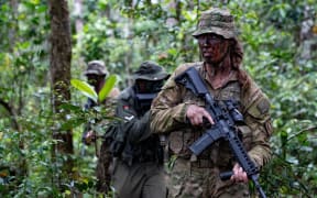 New Zealand Army and Republic of Fiji Military Forces personnel work together in the Nausori Highlands during Exercise Cartwheel 23.