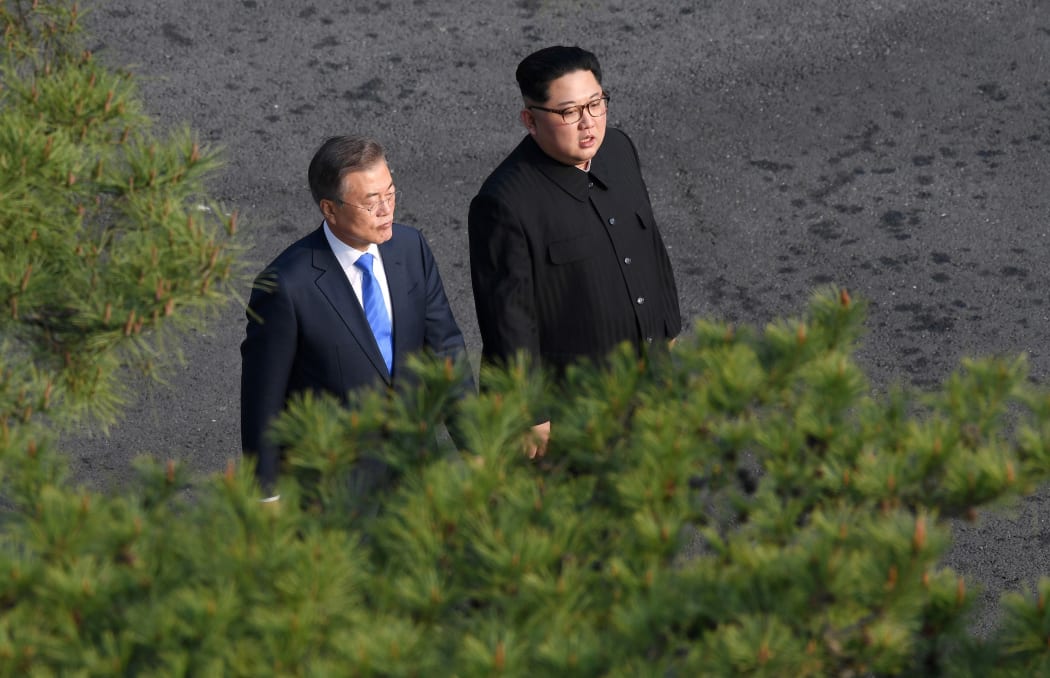 SEOUL; SOUTH KOREA - APRIL 27: South Korean president, Moon Jae-in (L) and North Korean leader Kim Jong-un