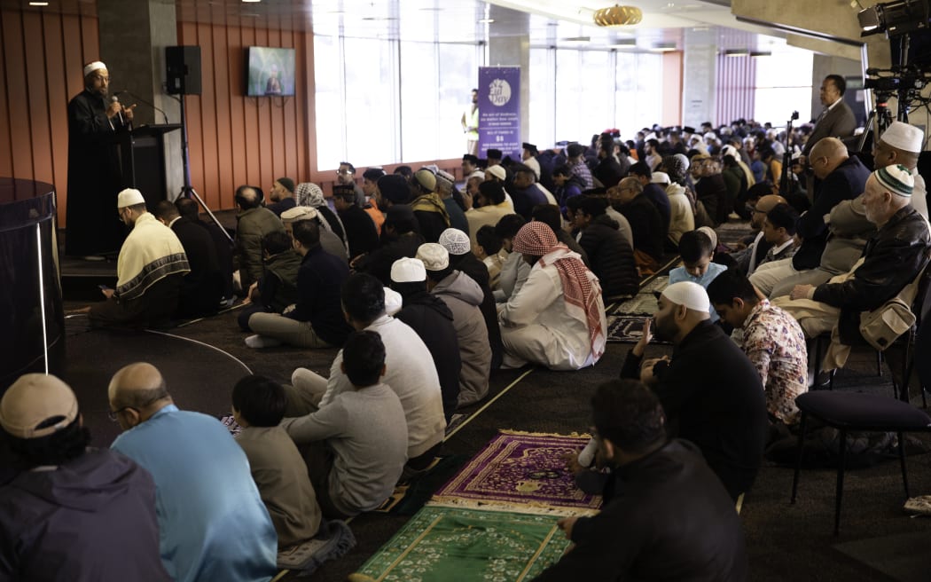 Mulsims pray at Eid celebrations inside Sky Stadium