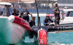 Team New Zealand helmsman Peter Burling gives the thumbs up after beating Oracle Team USA in race 8.