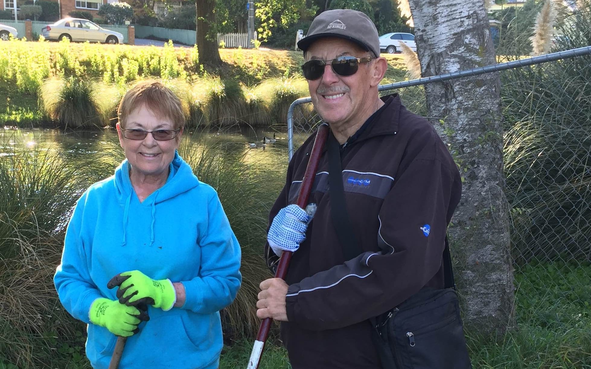 Volunteers Liz and Neville Barrie by the Avon with their haul of rubbish.