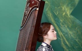 Guzheng virtuoso Xia Jing, photo courtesy Xia Jing
