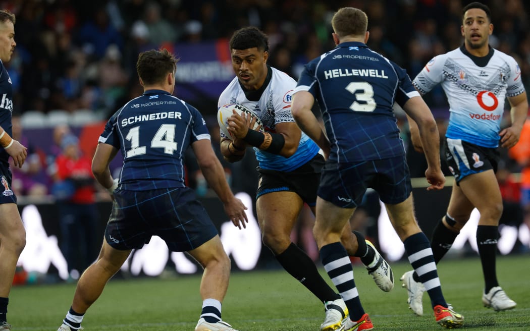 Taniela Sadrugu  of Fiji takes on  Kyle Schneider of Scotland during the Rugby League World Cup Pool B match between Fiji and Scotland at Kingston Park, Newcastle
