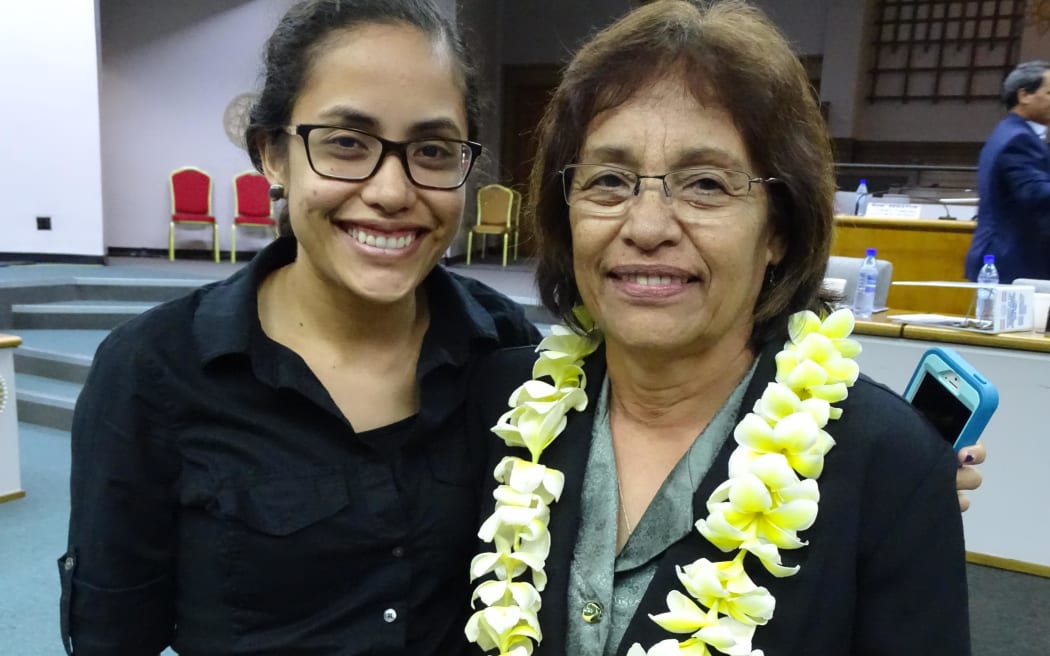 President Hilda Heine, right, with daughter Kathy Jetnil-Kijiner, minutes after being elected the first female president of the Marshall Islands in January 2016, was targeted for "revenge" by proponents of a controversial foreign investment scheme, said criminal charges filed by the US Justice Department in New York.