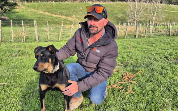 Dog triallist Chris Shaw and Miley, the 10-month-old Huntaway pup he's bred and is training to be a working dog.