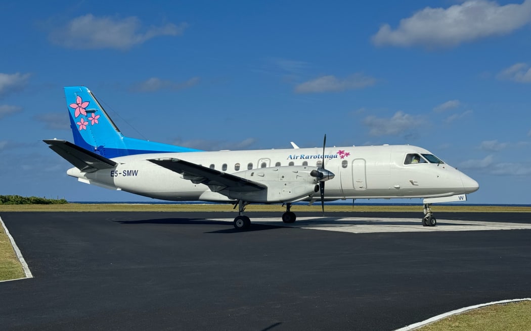 Air Rarotonga plane lands at the Aitutaki airstrip. 8 November 2023.
