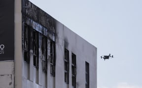 A drone being used by emergency services to inspect the Loafers Lodge hostel on Tuesday afternoon following the tragic fire. 16/5/23