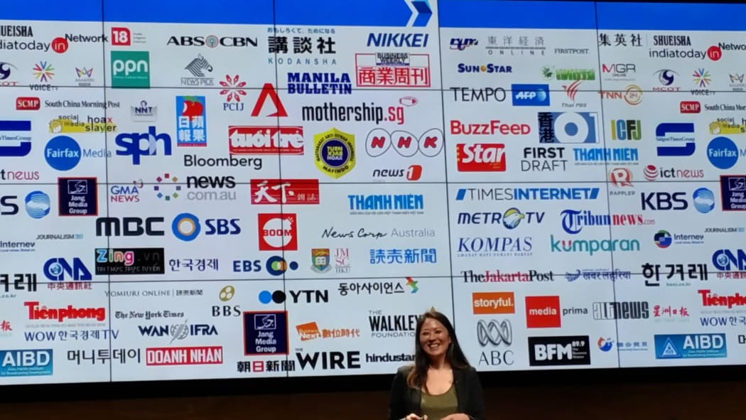 Irene Jay Liu, Google News Lab Asia Pacific in front of logos of media partners.