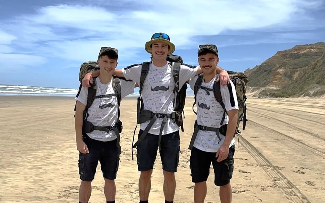 Tane Tarlton, Ben Reeve and Alex Smith are walking 60km from Dargaville's Baylys Beach to Whangārei's One Tree Point as part of the Movember charity's annual men's health movement.