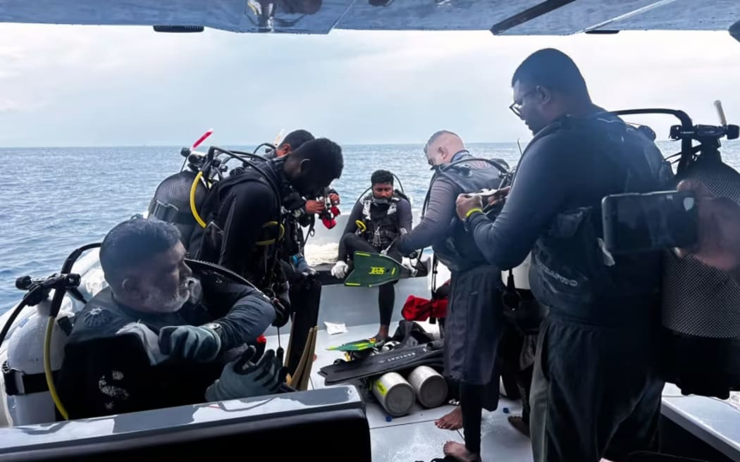 Top divers join mission to recover Italian tourists' remains from Maldives  sea cave | RNZ News
