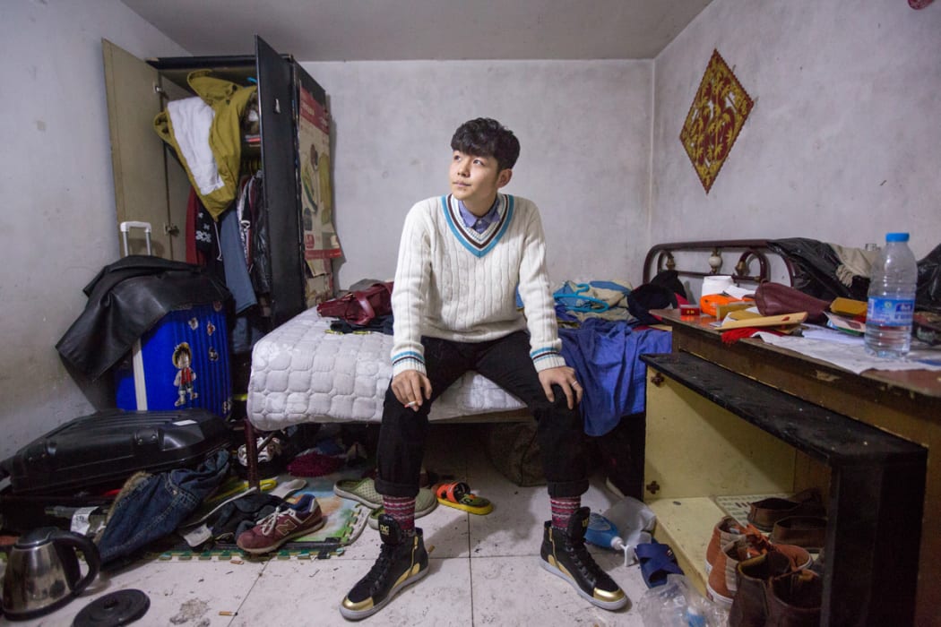 Jing Ranming in his underground apartment.